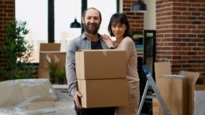 Portrait of life partners buying house on loan to move in