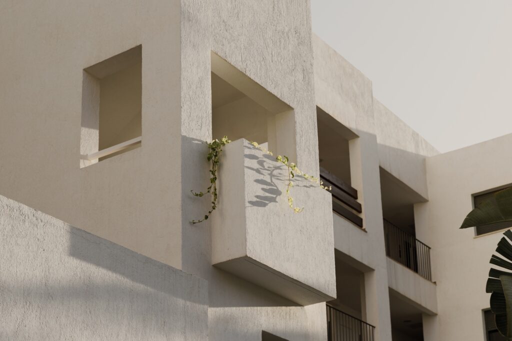 Spain modern architecture details, white house during sunset.