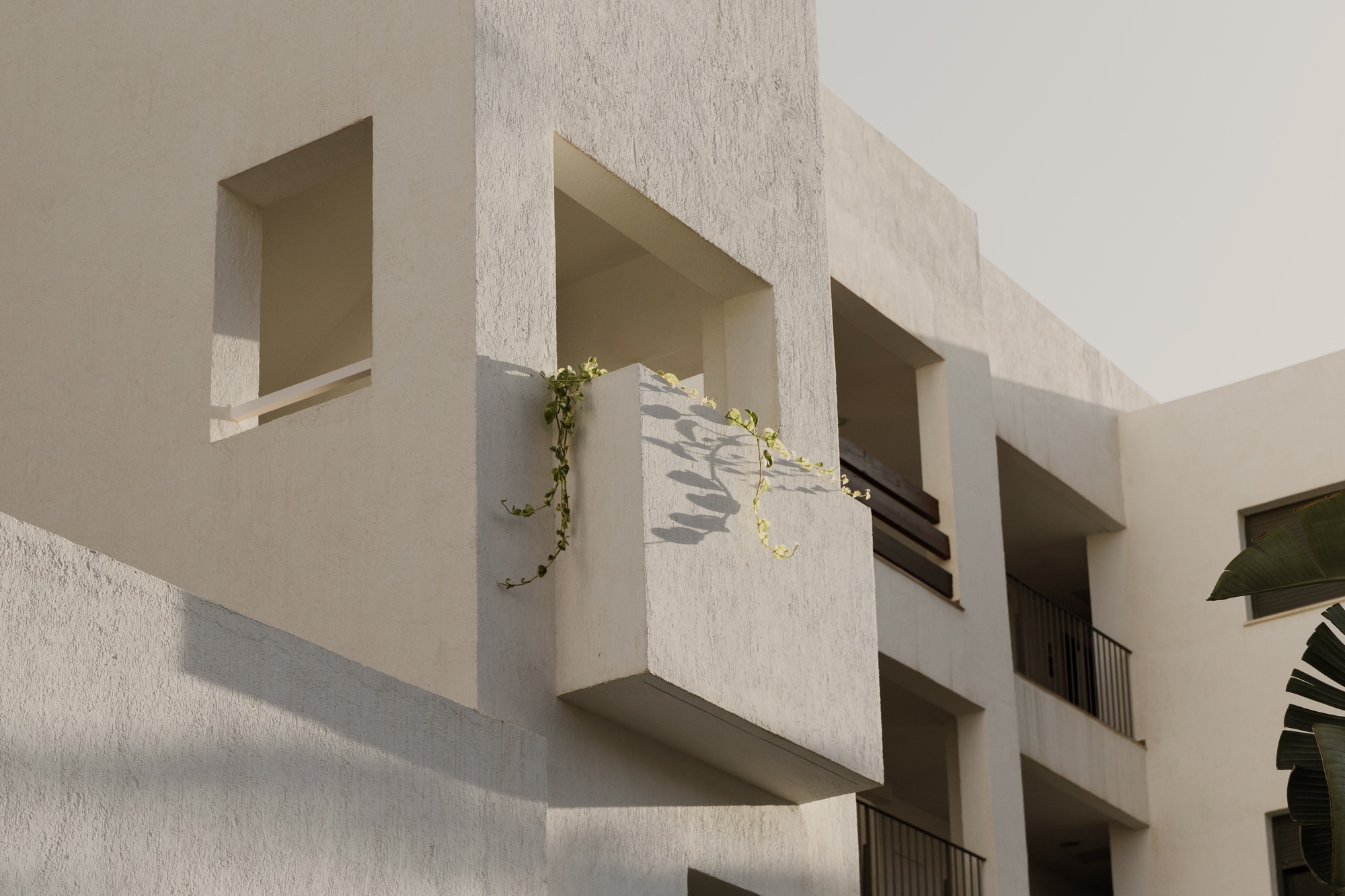 Spain modern architecture details, white house during sunset.