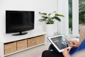 Elderly Woman Using Smart Home App