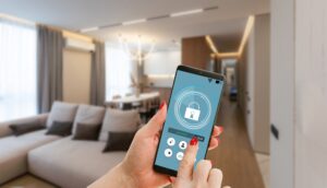 Mobile phone with app smarthome intelligent house automation remote control technology concept