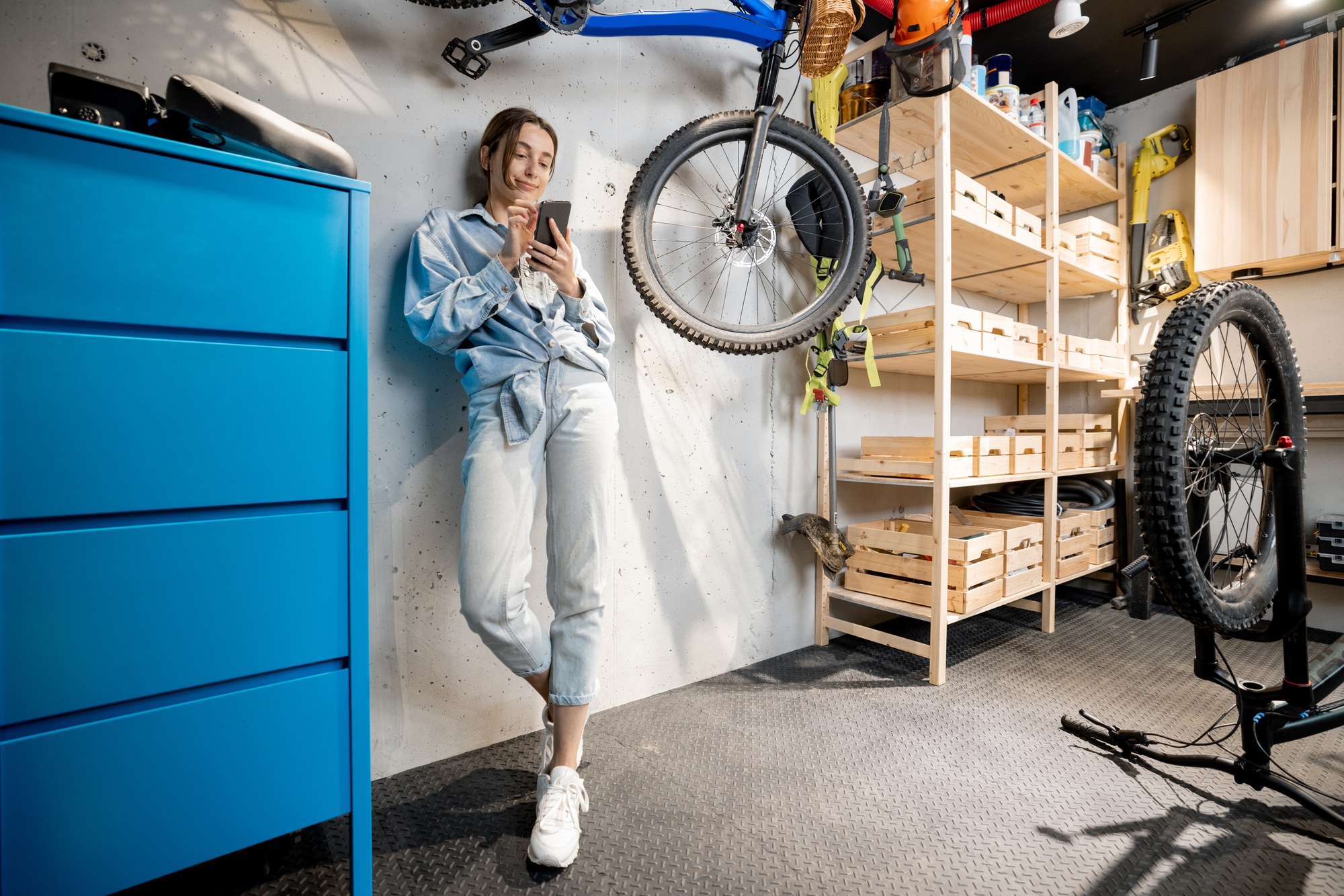 Handywoman in the workshop or garage at home