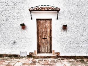 Closeup shot of a white house facade in Frigiliana, Spain
